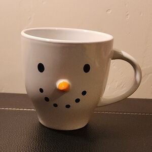 NWOT Snowman Mug Measures 4.5 inches tall and 4.25 inches across the top